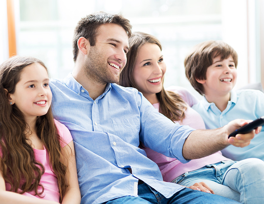 Family watching living scriptures videos