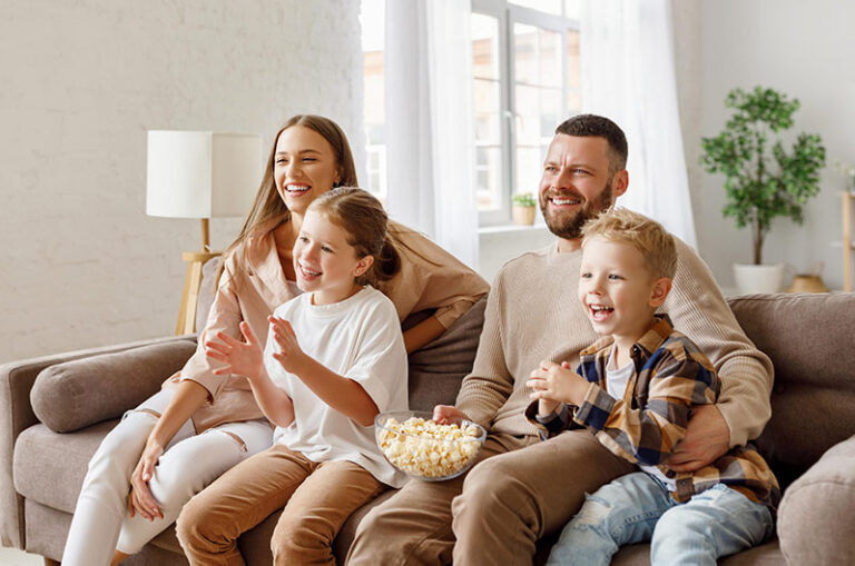 Family watching clean, funny movies